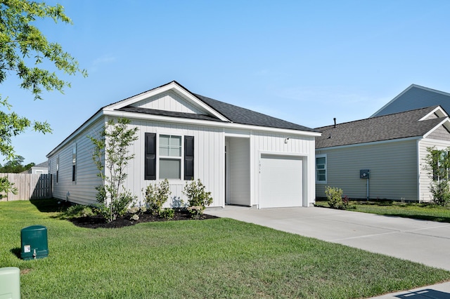 1014 Peridote Way, Ladson, SC 29456 - view of front of house featuring an attached garage, board and batten siding, and driveway