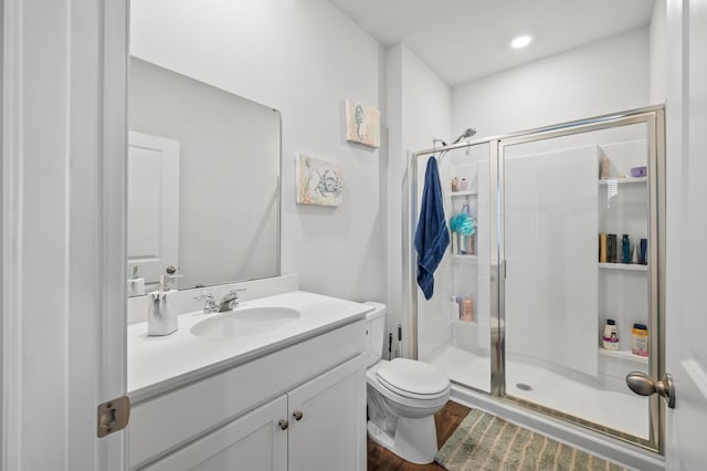 1014 Peridote Way, Ladson, SC 29456 - bathroom featuring a shower stall, vanity, toilet, and wood finished floors
