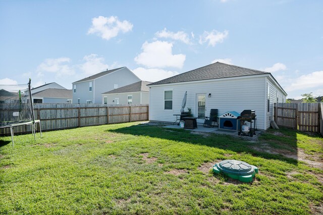 1014 Peridote Way, Ladson, SC 29456 - rear view of property with a trampoline and a patio area