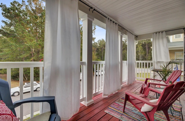 sunroom featuring a wealth of natural light