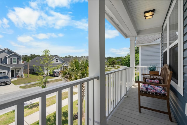 balcony featuring a residential view
