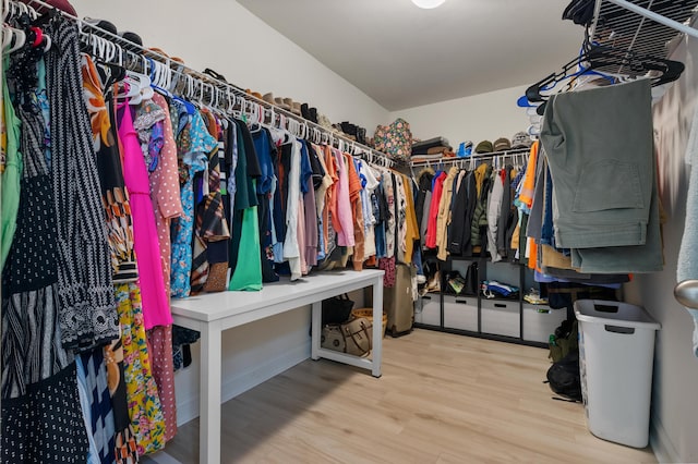 spacious closet with wood finished floors
