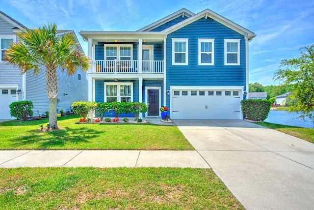 traditional home with a balcony, driveway, an attached garage, a front lawn, and a porch
