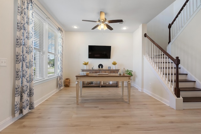 office featuring light wood-style flooring, ceiling fan, baseboards, and recessed lighting