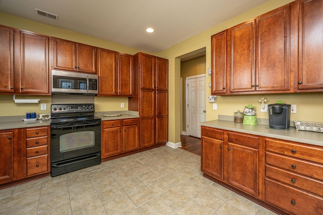 kitchen with black electric range oven