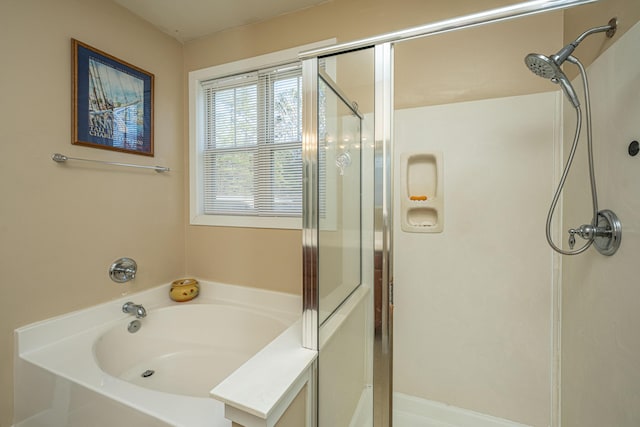 bathroom with independent shower and bath