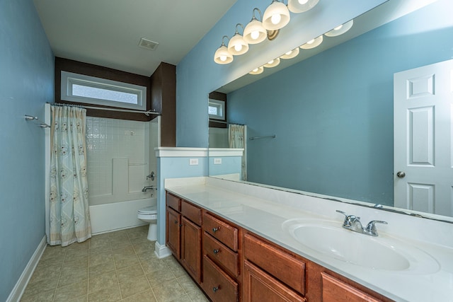 full bathroom featuring shower / bath combo, vanity, and toilet