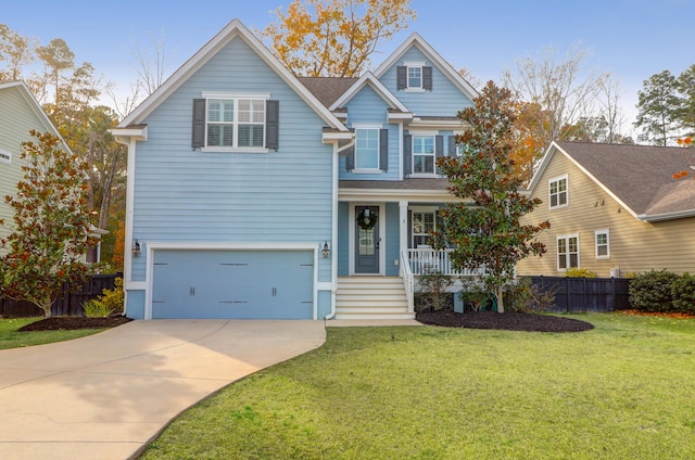 view of front facade with a porch, a front yard, and a garage