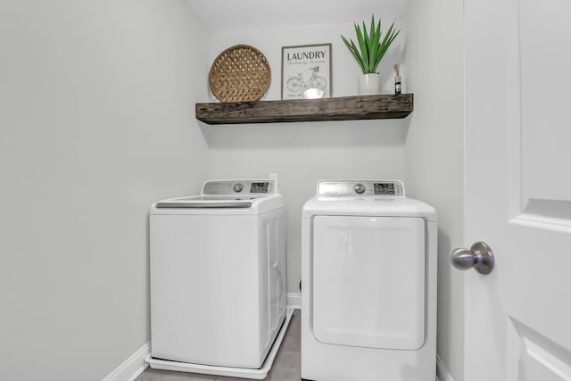 clothes washing area with independent washer and dryer