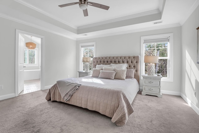 carpeted bedroom with multiple windows, ornamental molding, and ceiling fan