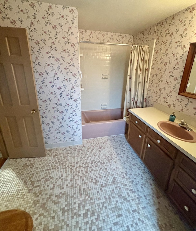 bathroom featuring tile patterned floors, shower / tub combo with curtain, and vanity