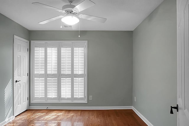 unfurnished room with ceiling fan and light hardwood / wood-style floors