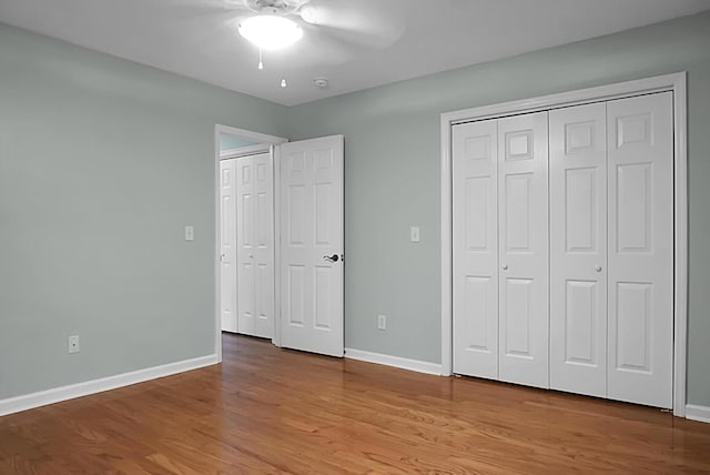 unfurnished bedroom featuring ceiling fan and light hardwood / wood-style flooring