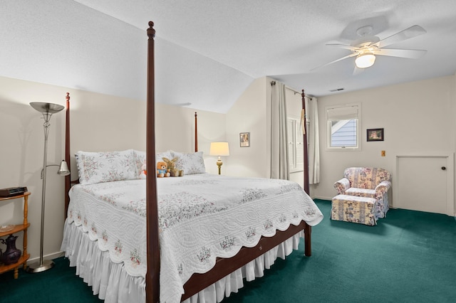 carpeted bedroom featuring ceiling fan, vaulted ceiling, and a textured ceiling