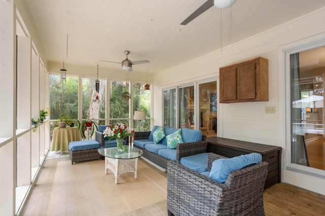 sunroom with wooden ceiling and ceiling fan