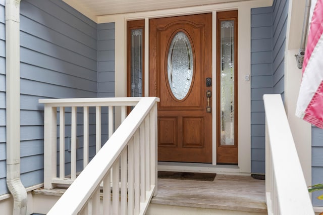 doorway to property with covered porch