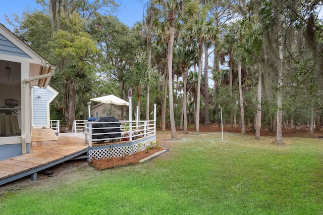 view of yard featuring a deck