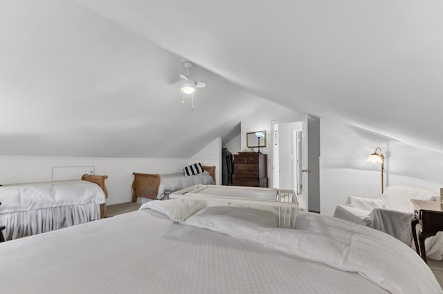 bedroom featuring lofted ceiling and a ceiling fan