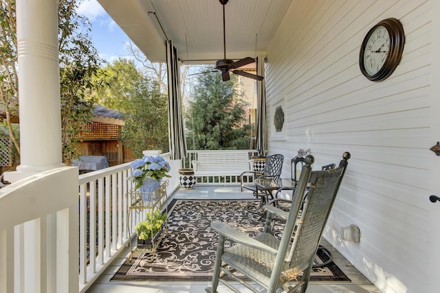 exterior space with ceiling fan