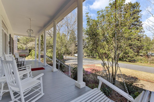 wooden deck with a porch