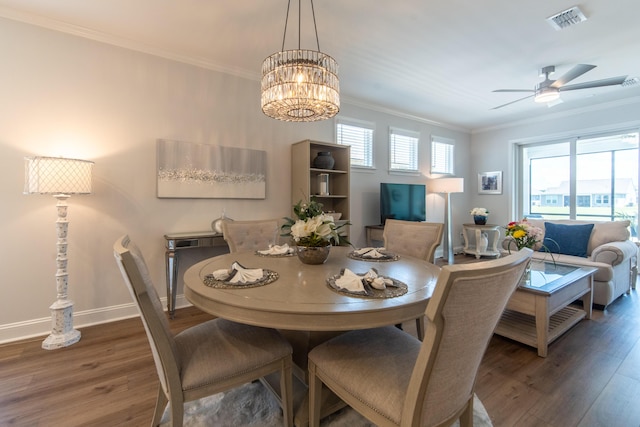 754 Blue Iris Way, Summerville, SC 29486 - dining space featuring wood finished floors, crown molding, plenty of natural light, a ceiling fan, and a chandelier