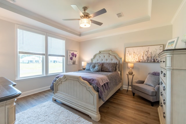 754 Blue Iris Way, Summerville, SC 29486 - bedroom featuring wood finished floors, a tray ceiling, crown molding, and ceiling fan
