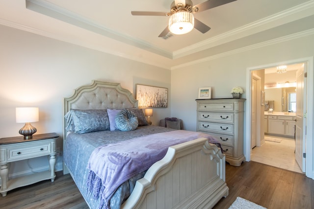754 Blue Iris Way, Summerville, SC 29486 - bedroom featuring wood finished floors, crown molding, a tray ceiling, ensuite bath, and a ceiling fan