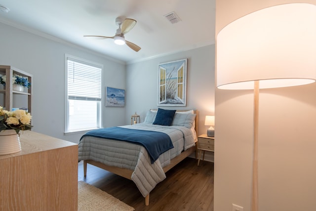 754 Blue Iris Way, Summerville, SC 29486 - bedroom with dark wood-type flooring, crown molding, and a ceiling fan