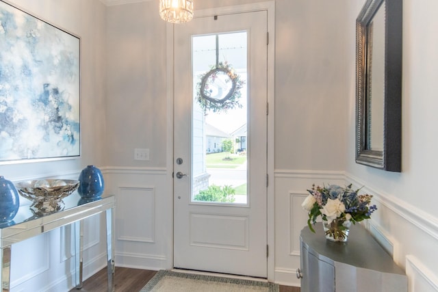 754 Blue Iris Way, Summerville, SC 29486 - foyer with a decorative wall, wainscoting, plenty of natural light, wood finished floors, and a chandelier