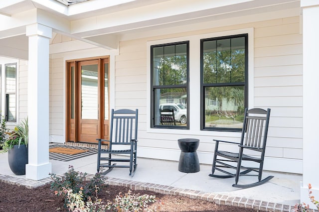 property entrance featuring covered porch