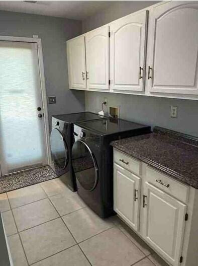 104 Legend Oaks Way, Summerville, SC 29485 - laundry area featuring light tile patterned flooring, cabinet space, and washer and dryer