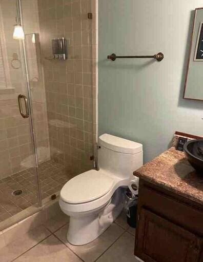 104 Legend Oaks Way, Summerville, SC 29485 - full bath with toilet, a stall shower, tile patterned flooring, and vanity