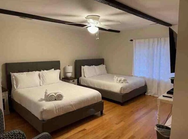 104 Legend Oaks Way, Summerville, SC 29485 - bedroom with beam ceiling, ceiling fan, and wood finished floors