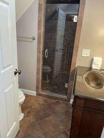 104 Legend Oaks Way, Summerville, SC 29485 - full bath with toilet, a shower stall, baseboards, and vanity