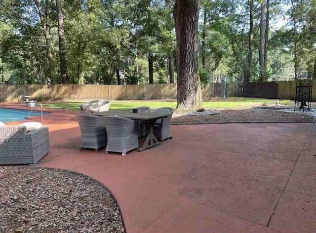 104 Legend Oaks Way, Summerville, SC 29485 - view of patio / terrace featuring a fenced in pool, outdoor dining space, and a fenced backyard