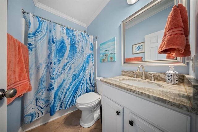 bathroom featuring vanity, toilet, crown molding, and tile patterned flooring