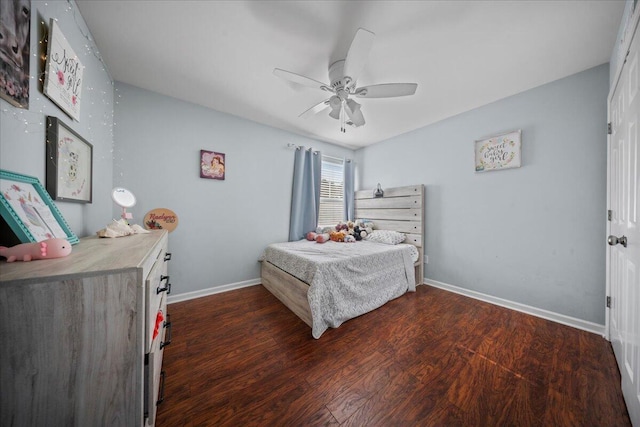 bedroom with wood finished floors, baseboards, and ceiling fan