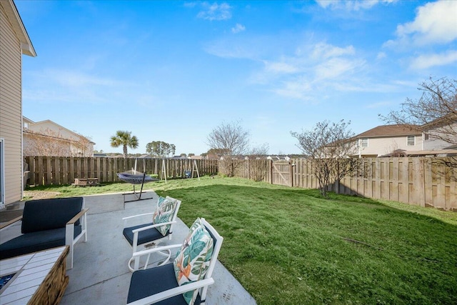 view of yard with a patio and a fenced backyard