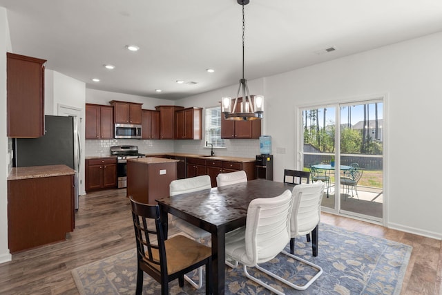 686 Redbud Ln, Summerville, SC 29486 - dining room featuring recessed lighting, visible vents, a chandelier, and dark wood finished floors