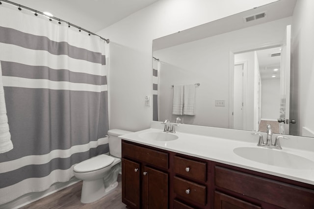 686 Redbud Ln, Summerville, SC 29486 - full bathroom featuring double vanity, visible vents, toilet, and a sink