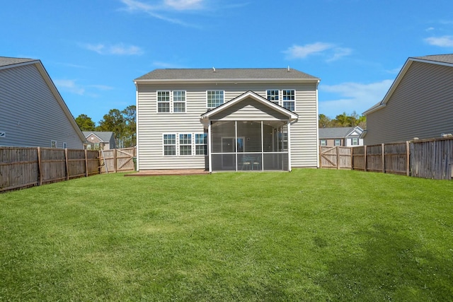 686 Redbud Ln, Summerville, SC 29486 - back of house featuring a fenced backyard, a lawn, a gate, and a sunroom