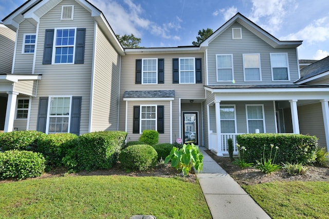 149 Woodward Rd, Goose Creek, SC 29445 - view of front facade with covered porch and a front lawn