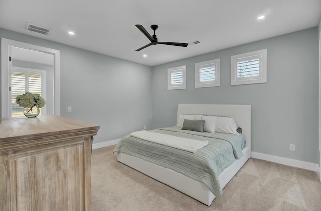 carpeted bedroom featuring ceiling fan