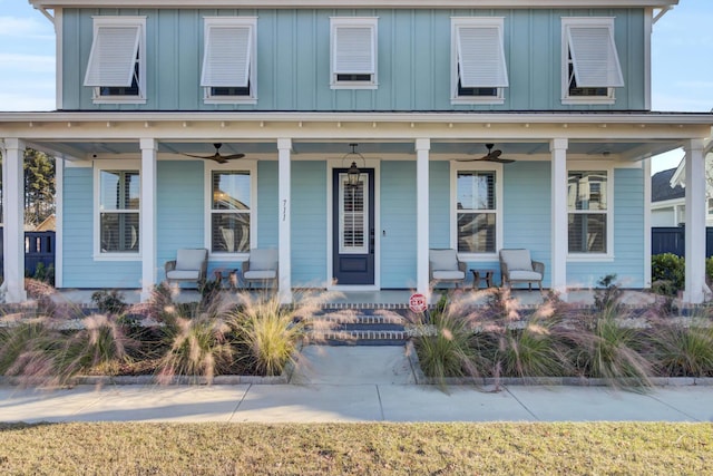 view of front of house featuring ceiling fan and covered porch