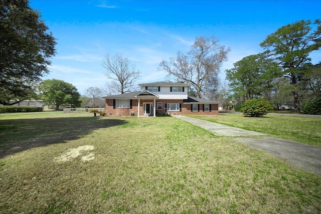 1115 O T Wallace Blvd, Moncks Corner, SC 29461 - view of front of house with brick siding and a front yard