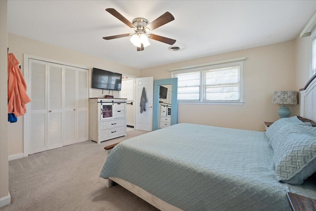 1115 O T Wallace Blvd, Moncks Corner, SC 29461 - bedroom featuring light colored carpet, a ceiling fan, baseboards, and a closet