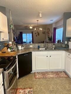 kitchen featuring white cabinets, kitchen peninsula, dishwasher, and range with two ovens