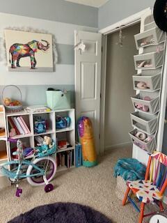 game room with carpet flooring