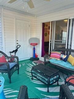 view of patio with ceiling fan and covered porch