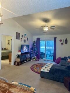 carpeted living room with ceiling fan and lofted ceiling